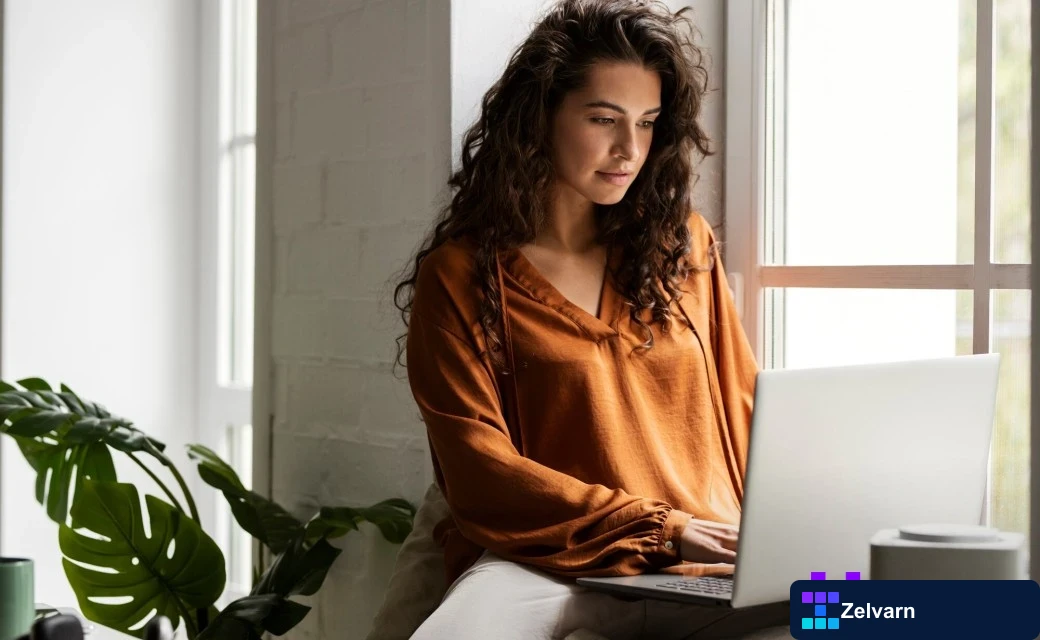 Medium shot woman working on laptop